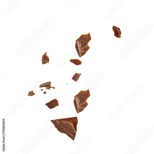 Flying chocolate  crumbs pieces isolated on white background. Broken choco crumbs  Top view. Flat lay.