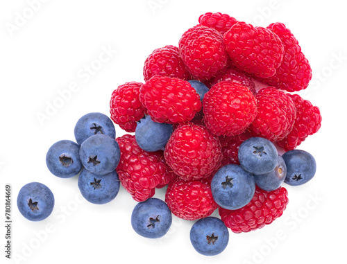 Wild Berries mix isolated on white background. Fresh raspberry and blueberry closeup.