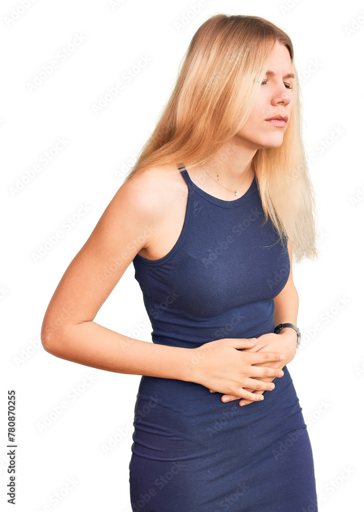Young beautiful blonde woman wearing casual dress with hand on stomach because indigestion, painful illness feeling unwell. ache concept. Young beautiful blonde woman wearing casual dress with hand on stomach because indigestion, painful illness feeling unwell. ache concept.