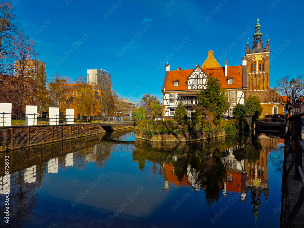 Fototapeta premium Gdansk, Poland March 21, 2023: View of the Millers Guild house and the Radunia Canal in Gdansk. Poland