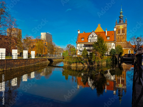 Gdansk, Poland  March 21, 2023: View of the Millers Guild house and the Radunia Canal in Gdansk. Poland photo