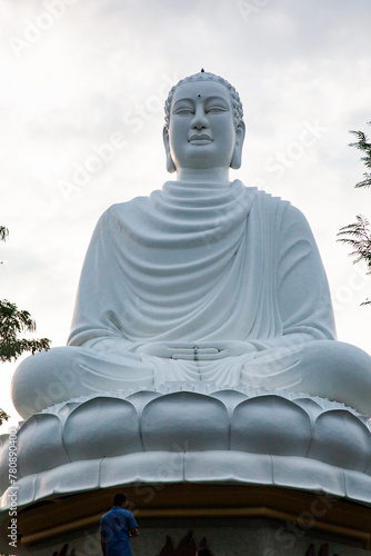 statue of the Buddha against the blue sky. Temple of the Buddha. Vietnam, Nha Trang, Pagoda photo