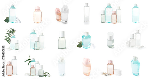 Set of many bottles of micellar water on white background