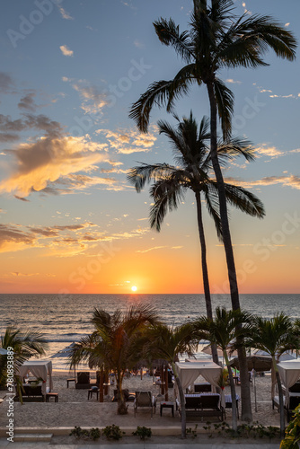 Sunset in Mexico at a tropical beach is a travel paradise filled with beautify