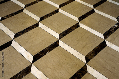 Background material showing a close-up of a three-dimensional floor designed with three types of tiles