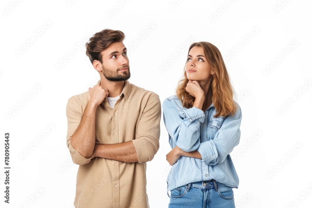 Happy young people man and woman in clothing thinking and touching chin while looking aside, isolated on white background Happy young people man and woman in clothing thinking and touching chin while looking aside, isolated on white background