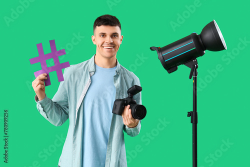 Handsome male photographer ...