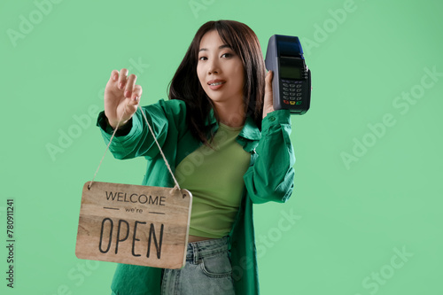 Young Asian woman holding t...