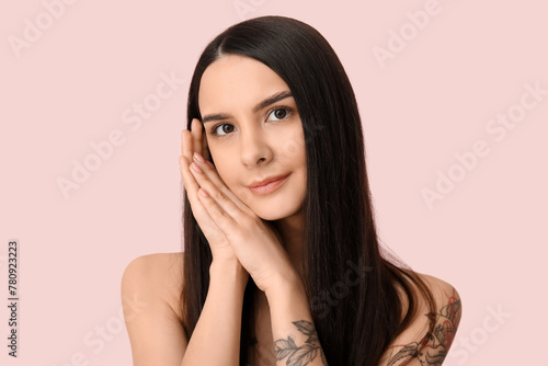 Beautiful young woman with ...