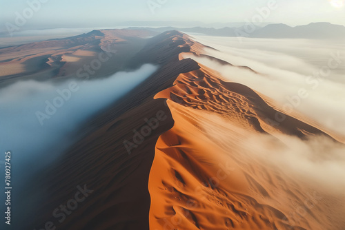 Misty sunrise over scenic desert dunes Generative AI image photo