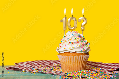Birthday Cupcake With Candle Number 10 And Question Mark
