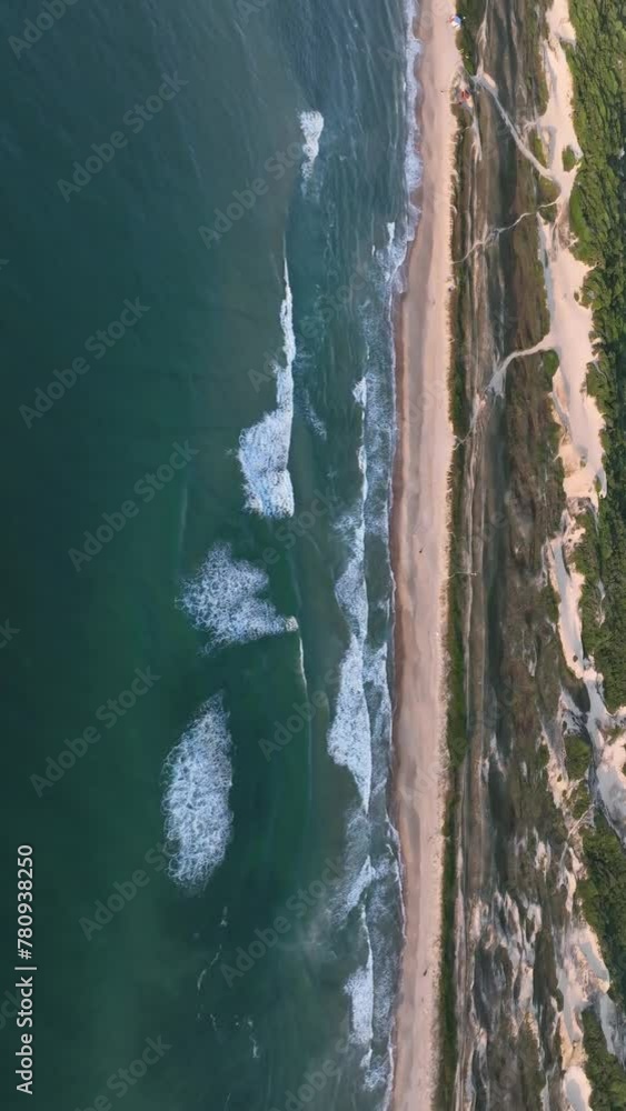 Florianópolis, Campeche beach during sunrise. Brazil. Rio Tavares neighborhood. Vertical video.
Florianópolis, Campeche beach during sunrise. Brazil. Rio Tavares neighborhood. Vertical video.