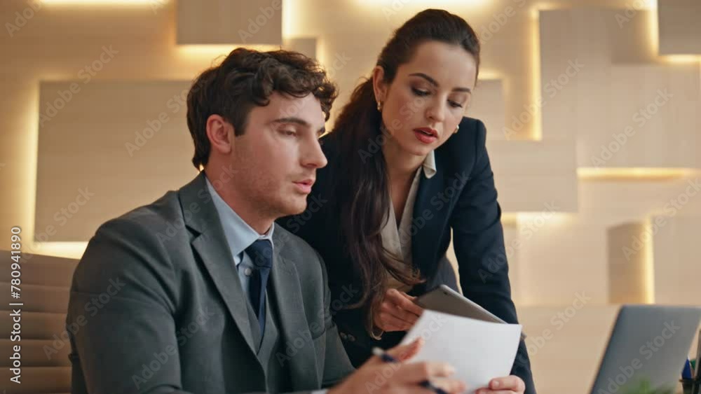 Woman boss talking colleague analyzing in office closeup. Team working together Woman boss talking colleague analyzing in office closeup. Team working together