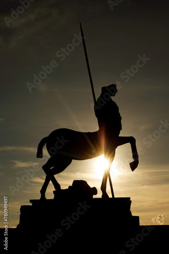 Silhouette of a Centauro - horseman statue during sunset in the ruined Roman city of Pompeii.
