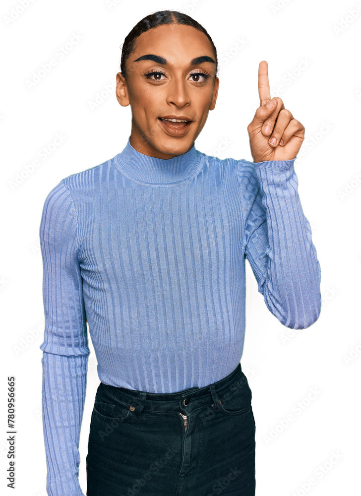 Hispanic transgender man wearing make up and long hair wearing casual clothes pointing finger up with successful idea. exited and happy. number one. Hispanic transgender man wearing make up and long hair wearing casual clothes pointing finger up with successful idea. exited and happy. number one.
