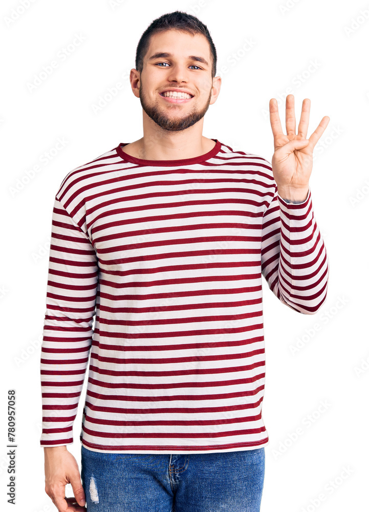 Young handsome man wearing striped sweater showing and pointing up with fingers number four while smiling confident and happy. Young handsome man wearing striped sweater showing and pointing up with fingers number four while smiling confident and happy.