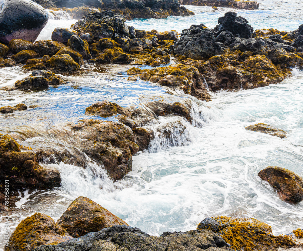 Waves Washing Over The Rocky Volcanic Shoreline at Wawalili Beach, Wawaloli Beach Park, Hawaii Island, Hawaii, USA Waves Washing Over The Rocky Volcanic Shoreline at Wawalili Beach, Wawaloli Beach Park, Hawaii Island, Hawaii, USA