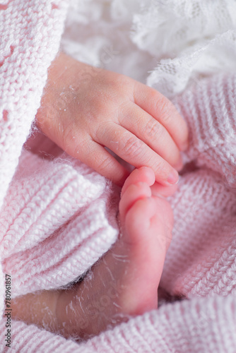 Little newborn baby hands 