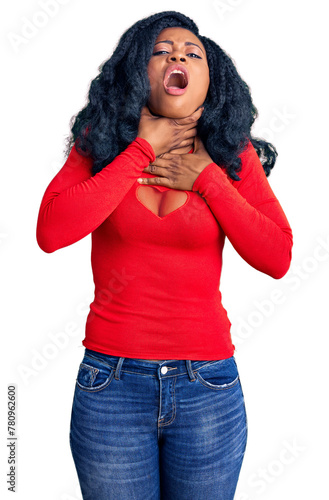 Beautiful african american woman wearing casual clothes shouting and suffocate because painful strangle. health problem. asphyxiate and suicide concept.