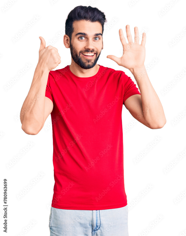 Young handsome man with beard wearing casual t-shirt showing and pointing up with fingers number six while smiling confident and happy. Young handsome man with beard wearing casual t-shirt showing and pointing up with fingers number six while smiling confident and happy.
