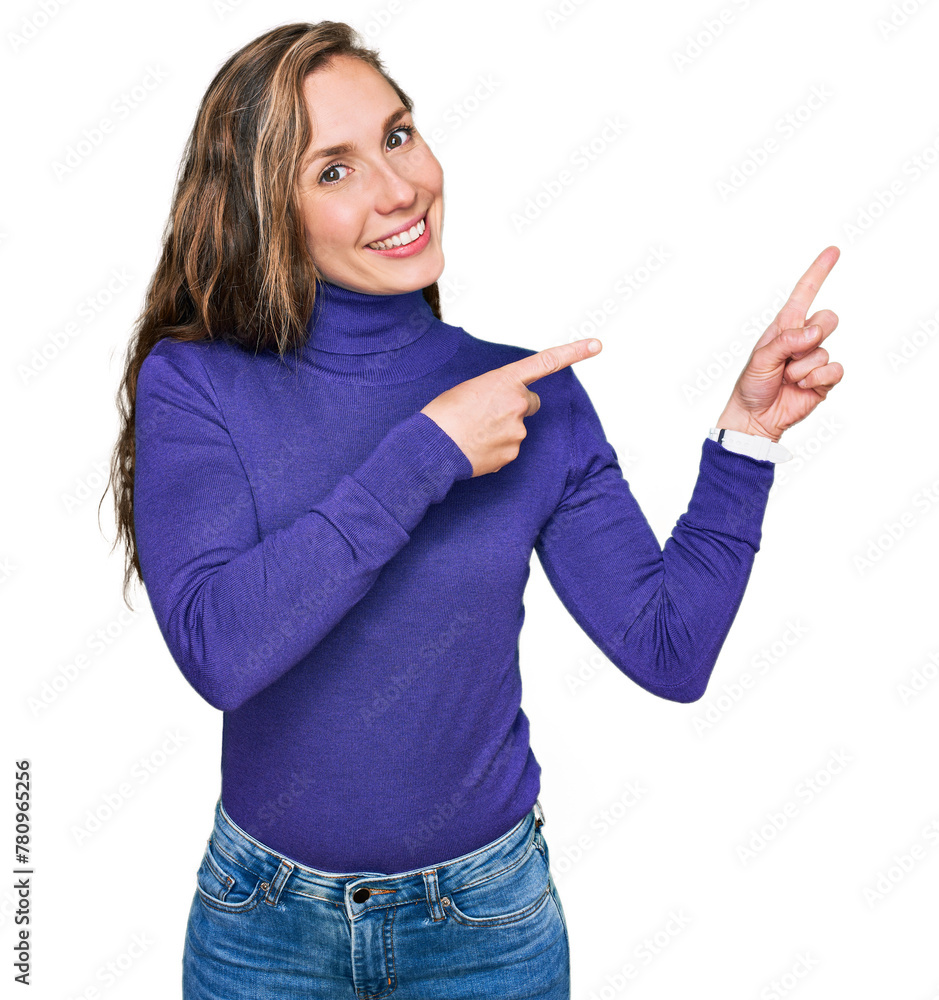 Young blonde woman wearing casual clothes smiling and looking at the camera pointing with two hands and fingers to the side. Young blonde woman wearing casual clothes smiling and looking at the camera pointing with two hands and fingers to the side.