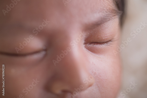 Newborn baby closed clse up eye photo