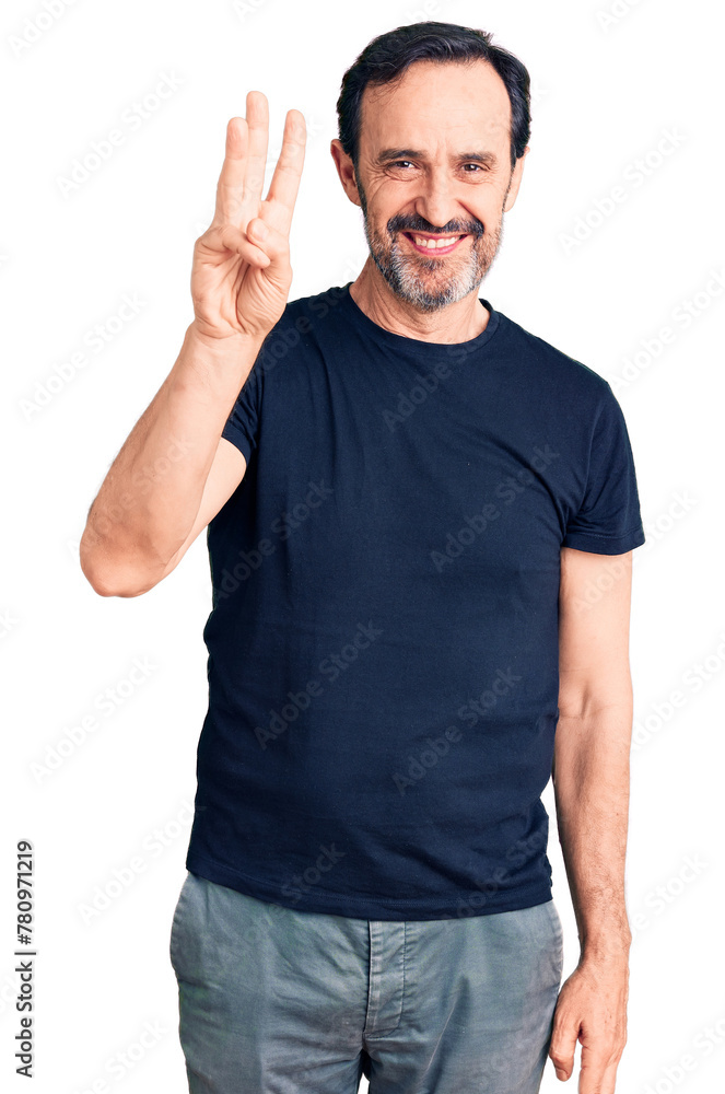 Middle age handsome man wearing casual t-shirt showing and pointing up with fingers number three while smiling confident and happy. Middle age handsome man wearing casual t-shirt showing and pointing up with fingers number three while smiling confident and happy.