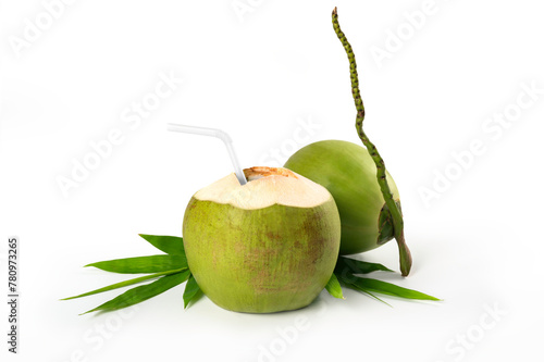 Fresh young coconuts with leaves isolated on white