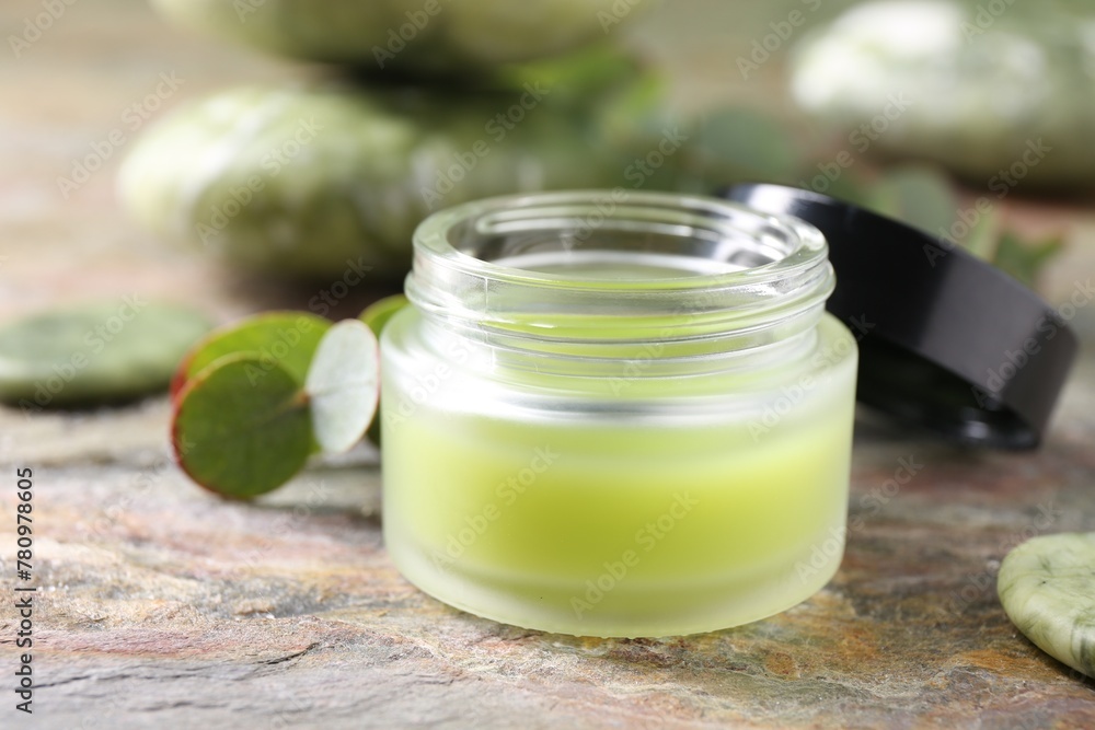 Jar of cream on textured table, closeup. Body care product Jar of cream on textured table, closeup. Body care product
