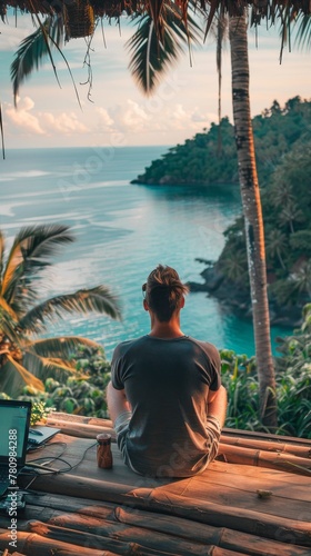 A peaceful remote work environment: laptop on a wooden desk, presenting a mesmerizing backdrop of crystal-clear ocean and rugged cliffs.