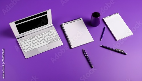 desktop with computer notepad pen pen phone and similar attributes, horizontal view, minimalist style, on purple background
