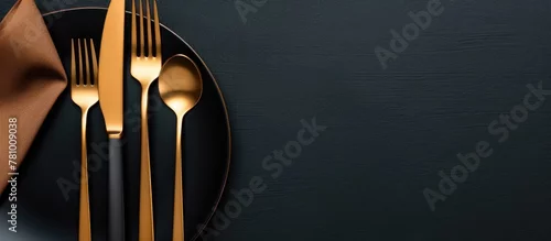 Obraz  z motywem Set table with silverware on a dish in close view