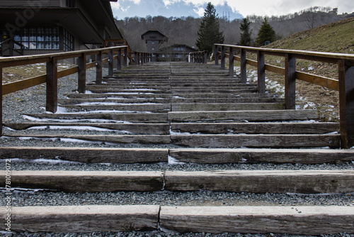 wooden stairs with stones and wooden railings © Bill Keefrey