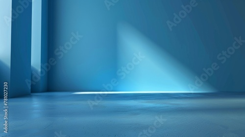 A serene blue space with light filtering through a window