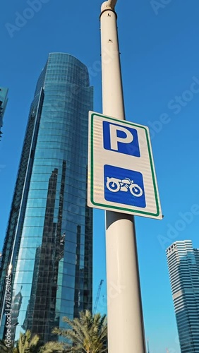 Vertical footage of motorbike motorbike signs in a residential area in Dubai photo