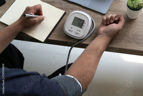 man checking blood pressure Health check blood pressure and heart rate at home