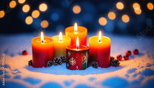 Christmas candles with christmas tree in a snowy background