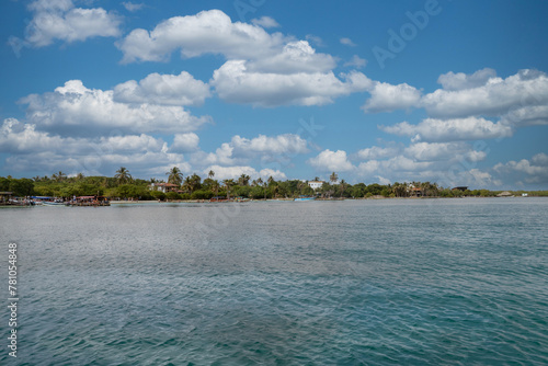 Palma island seen from a boat with sea and blue sky. San Bernardo Colombia. 