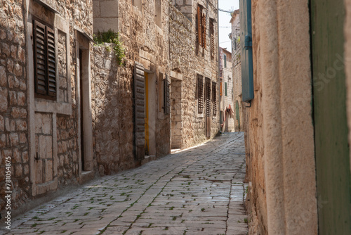 Narrow alleyway between buildings in residential district on Hvar