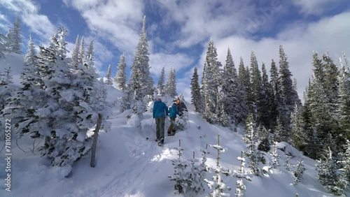 Snow Shoeing ascending mountain in Montana photo