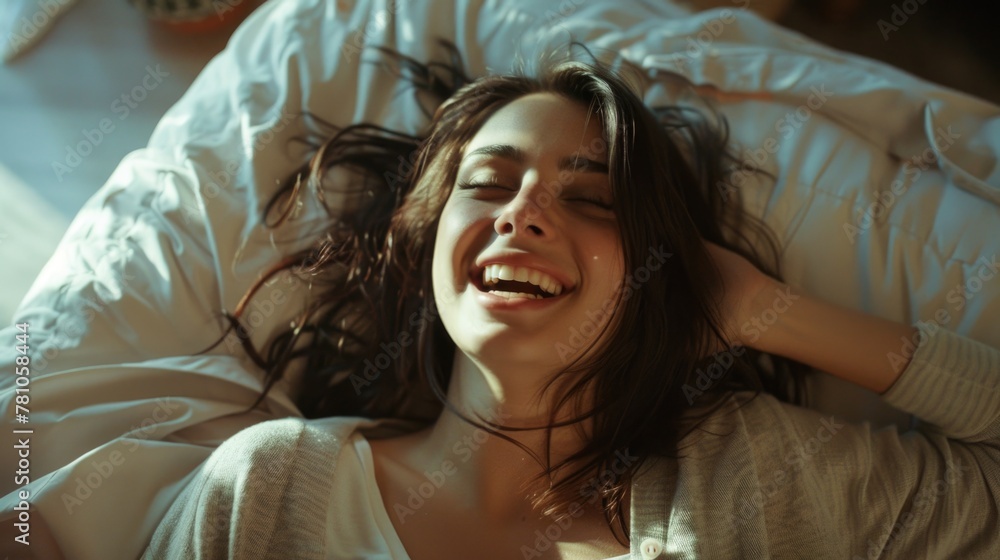 Fototapeta premium A woman peacefully resting in bed. Suitable for relaxation and sleep-related concepts