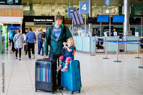 Photography Cute little toddler girl and father at the airport