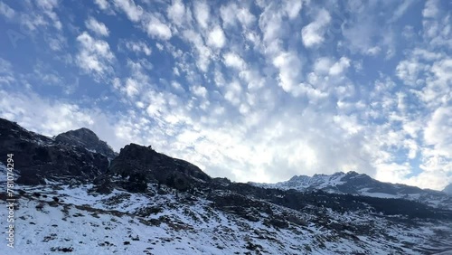 Snow filled mountains with blue skies landscape near Manali Kashmir Rothang pass India photo