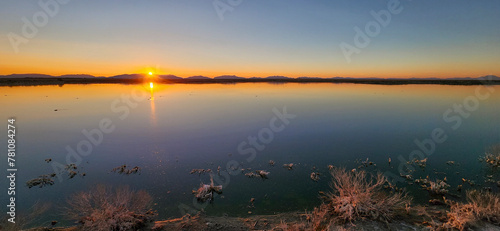 A scenic sunset view of Holloman Lake in New Mexico.