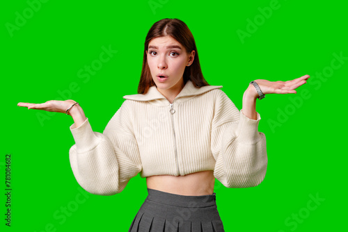 A woman wearing a white sweater is extending her hands outward in a gesture of offering or receiving.