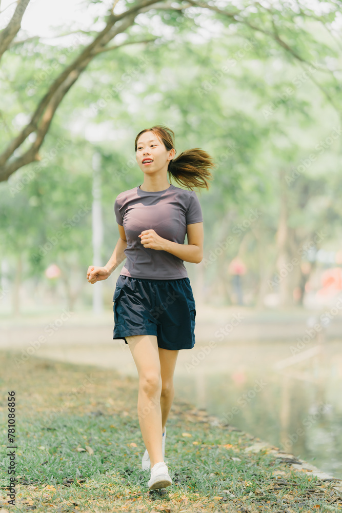 Beautiful Sport woman in sportswear running in the park. Healthy lifestyle and sport concept. Beautiful Sport woman in sportswear running in the park. Healthy lifestyle and sport concept.