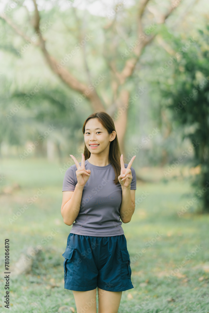 Beautiful Sport woman in sportswear running in the park. Healthy lifestyle and sport concept. Beautiful Sport woman in sportswear running in the park. Healthy lifestyle and sport concept.
