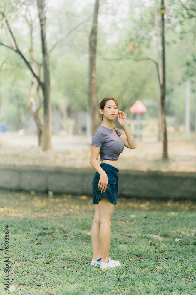 Beautiful Sport woman in sportswear running in the park. Healthy lifestyle and sport concept.