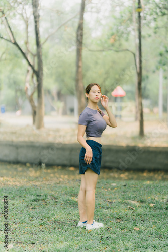 Beautiful Sport woman in sportswear running in the park. Healthy lifestyle and sport concept.