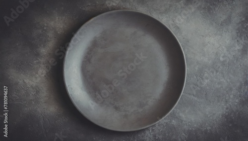 empty gray plate on gray rustic concrete background top view flat lay